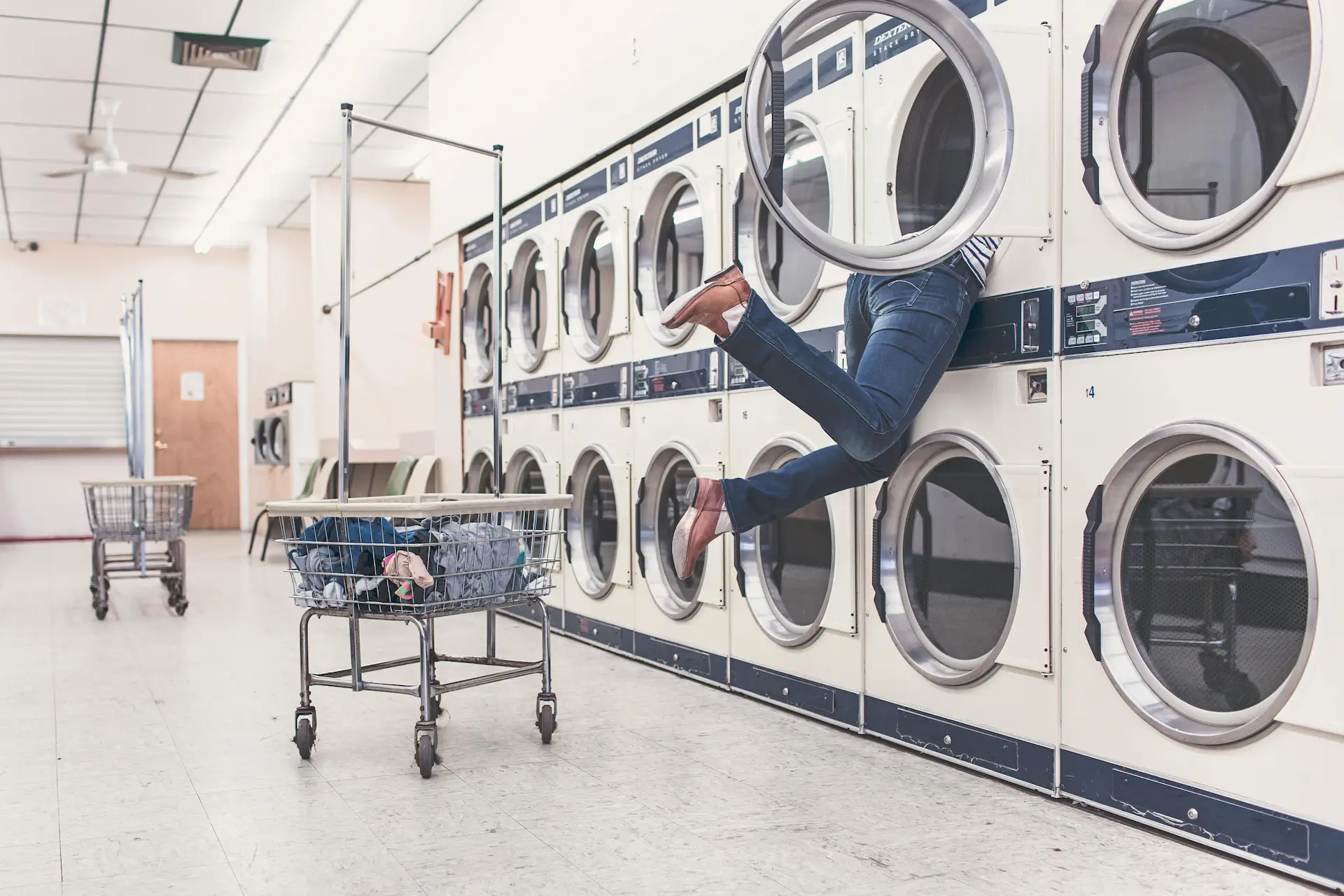 funny woman in laundry machine